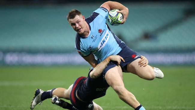 Tom Horton of the Waratahs is tackled by Andrew Kellaway during NSW’s embarrassing loss against the Rebels last week Picture: Getty Images