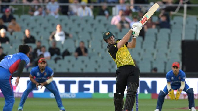 Mitch Marsh hits out against Afghanistan in front of a small Adelaide Oval crowd. Picture: Brenton Edwards / AFP