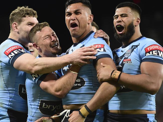 TOWNSVILLE, AUSTRALIA - JUNE 09:  Daniel Saifiti of the Blues celebrates with team mates after scoring a try during game one of the 2021 State of Origin series between the New South Wales Blues and the Queensland Maroons at Queensland Country Bank Stadium on June 09, 2021 in Townsville, Australia. (Photo by Ian Hitchcock/Getty Images) *** BESTPIX ***