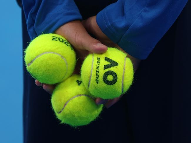 PERTH, AUSTRALIA - DECEMBER 30: A ballboy holds tennis balls in the Men's singles match between Zhang Zhizhen of China and JiÃâ¢ÃÂ­ LeheÃÂka of the Czech Republic during day two of the 2024 United Cup at RAC Arena on December 30, 2023 in Perth, Australia. (Photo by Will Russell/Getty Images)