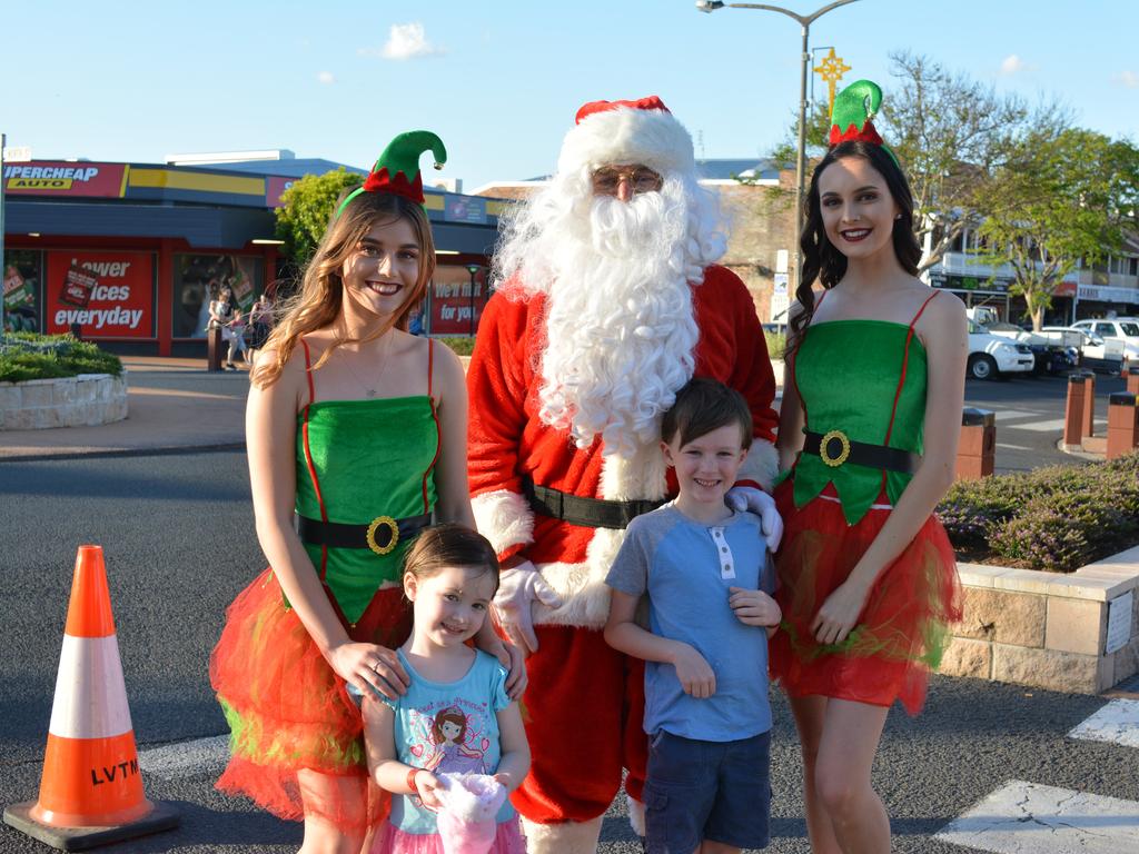 Rhylen,6, and Emmi, 4, got up close and personal with Santa and his helpers at the 2017 Gatton Christmas Carnival.