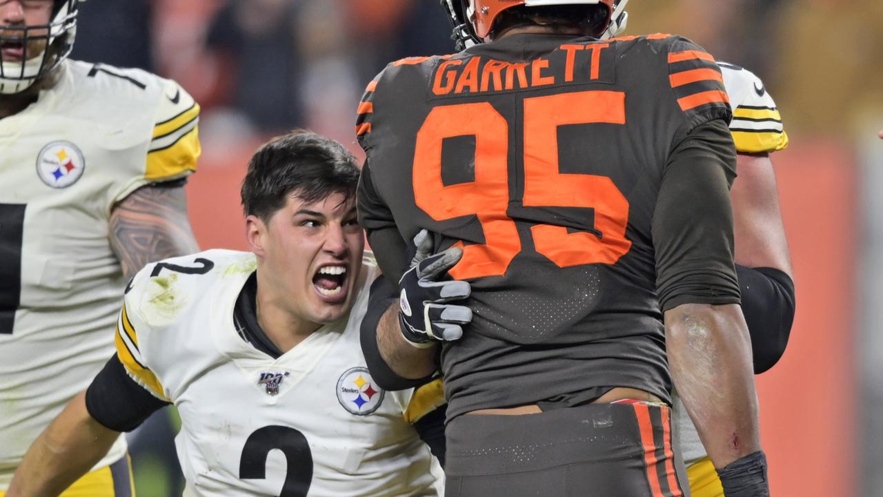 Pittsburgh Steelers quarterback Mason Rudolph goes after Cleveland Browns defensive end Myles Garrett.