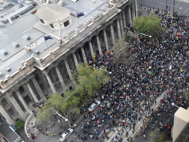 Climate change protesters during The Global Strike 4 Climate rally in Adelaide, outside Parliament House. Picture: AAP / David Mariuz