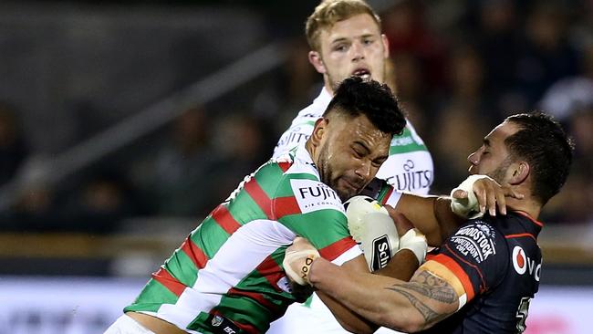 Zane Musgrove of the Rabbitohs is tackled by Jacob Lillyman, left, and Bodene Thompson of the Warriors during the Round 23 NRL match between the New Zealand Warriors and South Sydney Rabbitohs at Mount Smart Stadium in Auckland, New Zealand on Saturday, August 13, 2016. (AAP Image/David Rowland) NO ARCHIVING, EDITORIAL USE ONLY