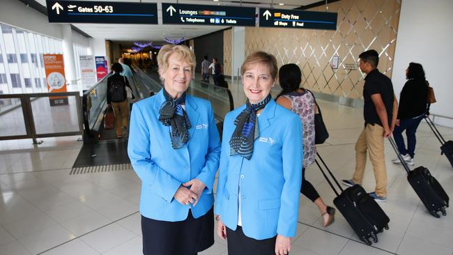 Sydney airport's volunteer ambassadors ( L to r ) Yvonne Merchant and Adele McWhinney pictured at Sydney international terminal, wearing their new uniforms.