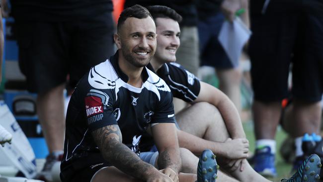 Quade Cooper pictured on the sideline during a Wests v Souths game in Brisbane.