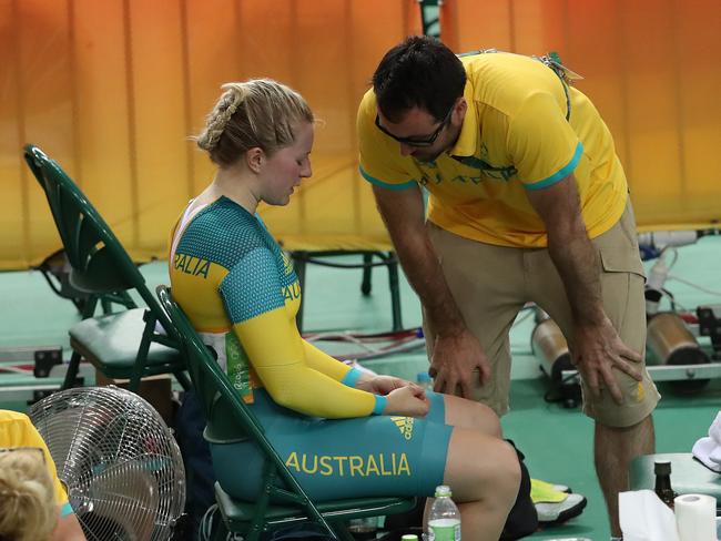 Stephanie Morton returns to the pits and gets a hug from Anna Meares after being beaten during the Women's Sprint at the Rio Olympics 2016 track cycling at the Rio Olympic Velodrome. Pics Adam Head