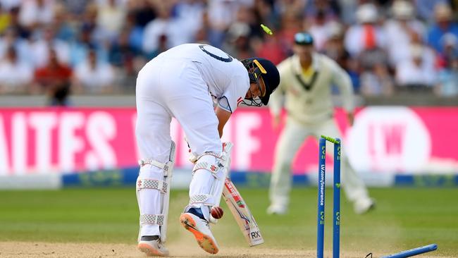 All over: Ollie Pope loses his off stump to Pat Cummins. Picture: Getty