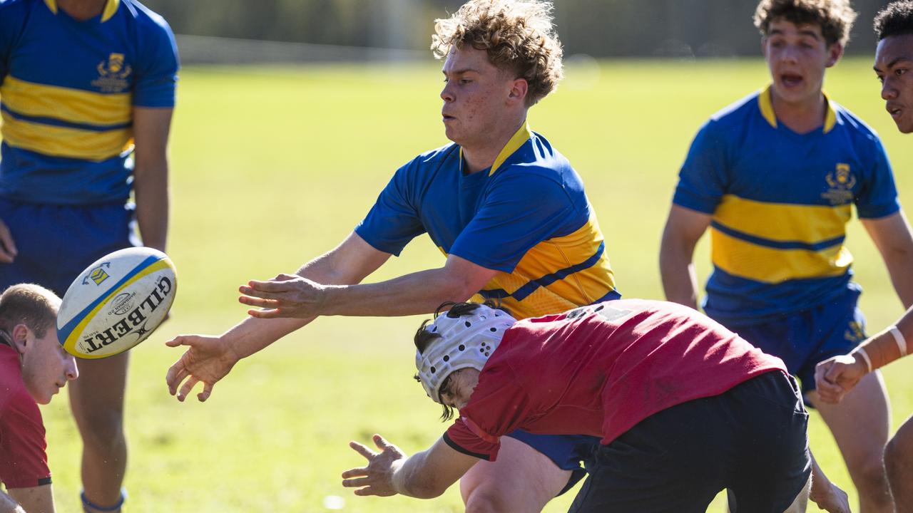 Myles Rosemond of Toowoomba Grammar School 1st XV is tackled by Archer Ilott of St Joseph's College, Gregory Terrace 1st XV in Round 6 GPS Queensland Rugby at TGS Old Boys Oval, Saturday, August 17, 2024. Picture: Kevin Farmer