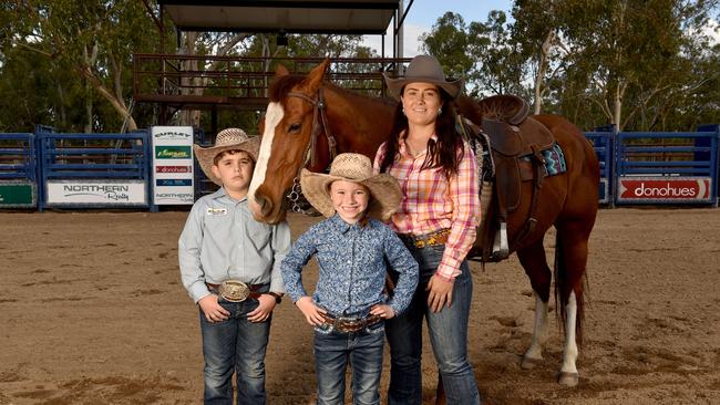 Kash Blacklock, 8, Brooklen Small, 6, and Brittany Watkinson with Bekky can't wait for the 2021 Elite Rodeo at Alice River. Picture: Evan Morgan