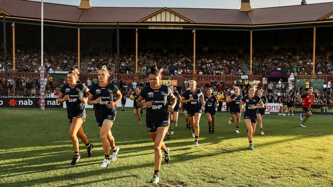 Adelaide’s AFLW side runs out for a match at Norwood Oval. Picture: AFL Media/Getty Images