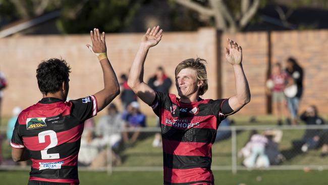 Denzel Burns and Dylan Chown celebrate Valleys 2019 grand final win. Both players feature in our star performances list here.