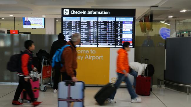 SYDNEY, AUSTRALIA  - AUGUST 15 2023: A general view of the Departures Terminal at Sydney International Airport, after a man who forced a Malaysia Airlines plane to make a dramatic turn back to Sydney International Airport after he became unruly and made references to Islam has been arrested. The MH122 Airbus-a330 flight to Kuala Lumpur was diverted back to Sydney and was isolated on the tarmac with AFP officers called to the emergency just before 4pm on Monday. Picture: NCA Newswire / Gaye Gerard