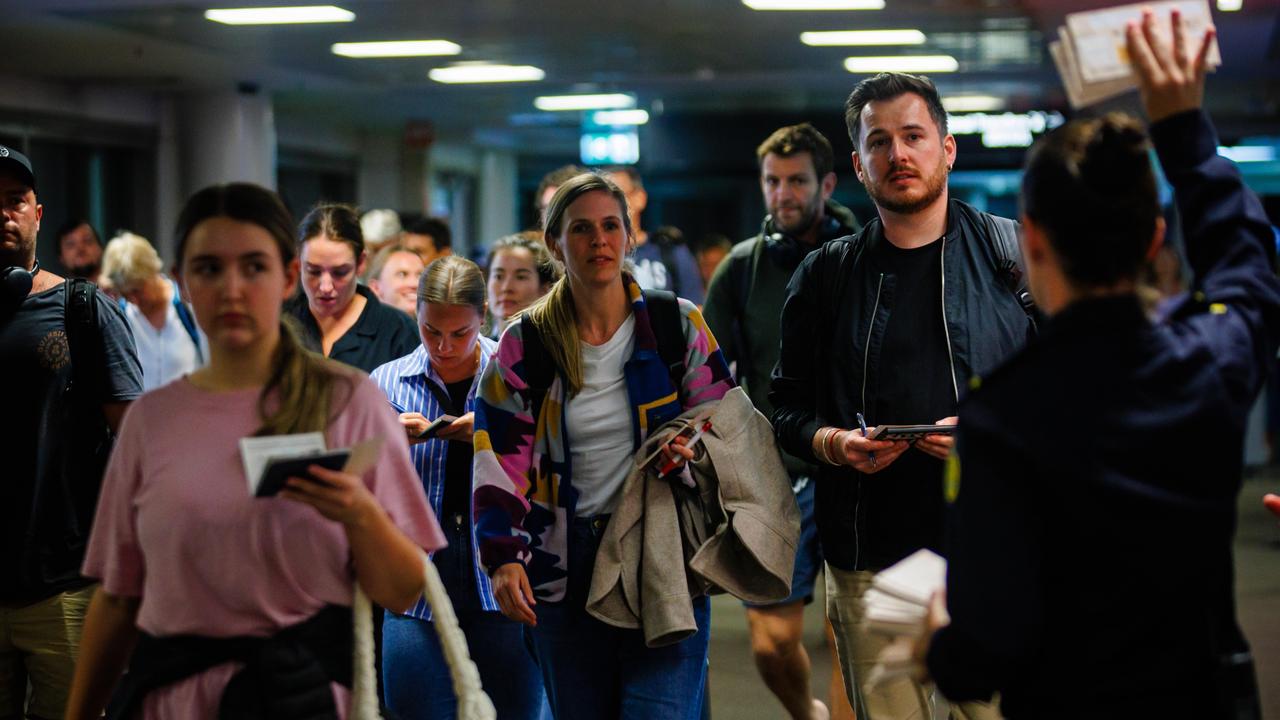 Australians have started to make their way home after being stranded in New Caledonia during the riots. Picture: POOL/AFP Photo/Patrick Hamilton/NewsWire