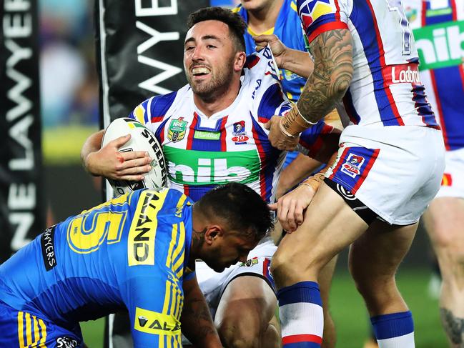 Newcastle's Brock Lamb celebrates scoring a try during the Parramatta Eels v Newcastle Knights rugby league match at ANZ Stadium, Homebush. Picture: Brett Costello