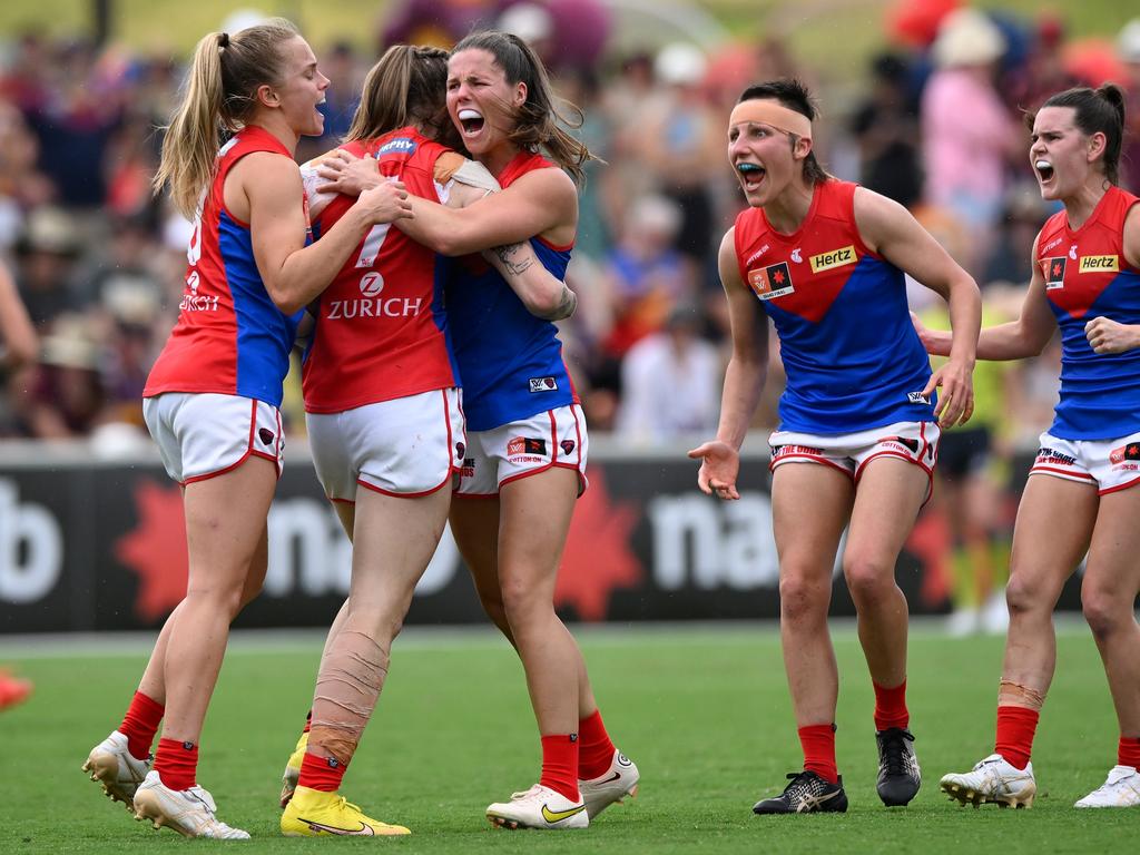 Tayla Harris of the Demons celebrates kicking a goal with team mates during the AFLW Grand Final match between the Brisbane Lions and the Melbourne Demons at Brighton Homes Arena on November 27, 2022 in Brisbane, Australia. (Photo by Matt Roberts/AFL Photos/Getty Images)