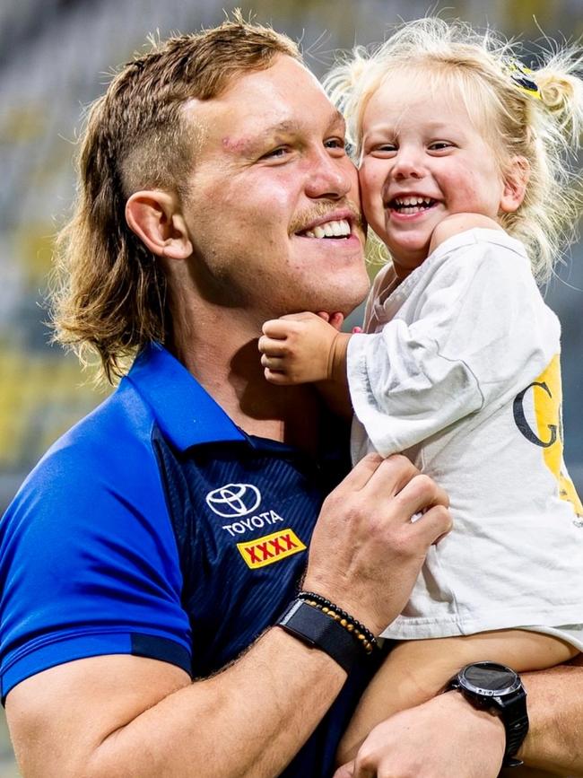 Reuben Cotter with daughter Sunny at a Cowboys game