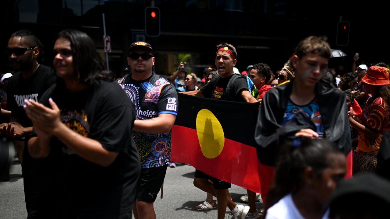 Protesters take part in an Invasion Day rally and march in Brisbane, coinciding with Australia Day. Picture: NCA Newswire / Dan Peled