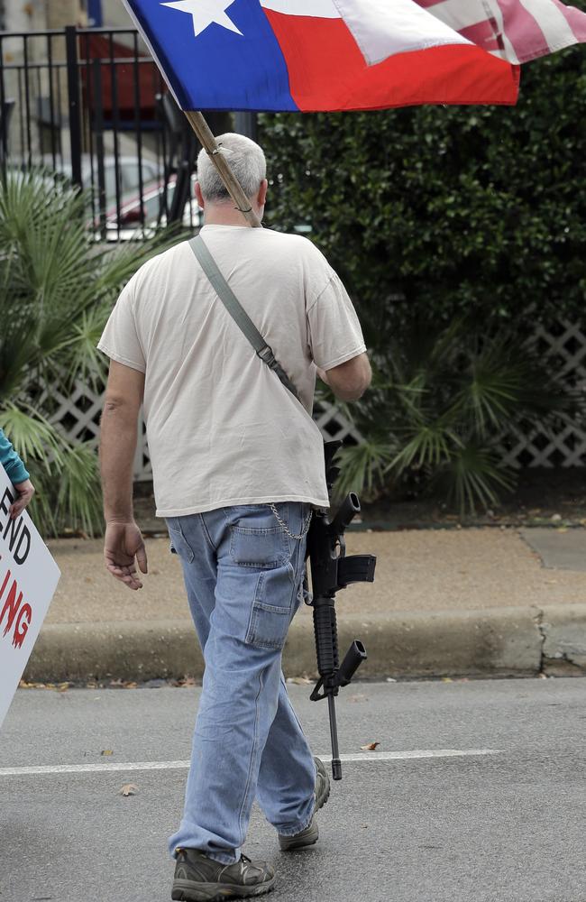 Yep, Americans can legally walk around like this. Picture: AP Photo/Eric Gay