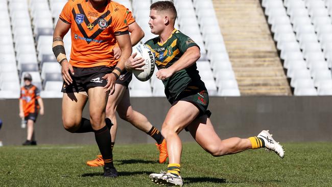 Mittagong's Samuel Ellis goes for a run. Picture: John Appleyard