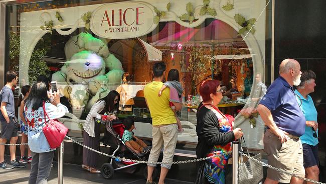 People view the annual Myer Christmas windows display on Bourke St. Picture: Scott Barbour