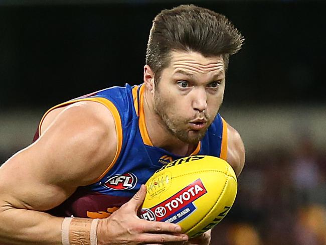 BRISBANE, AUSTRALIA - AUGUST 10: Stefan Martin of the Lions runs with the ball during the round 21 AFL match between the Brisbane Lions and the Gold Coast Suns at The Gabba on August 10, 2019 in Brisbane, Australia. (Photo by Jono Searle/AFL Photos via Getty Images)