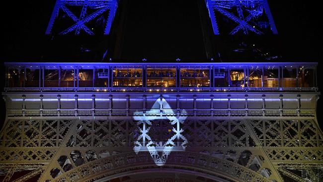 the Eiffel Tower illuminated with the Star of David and colours of national flag of Israel, in tribute to the victims of the recent Hamas attacks.