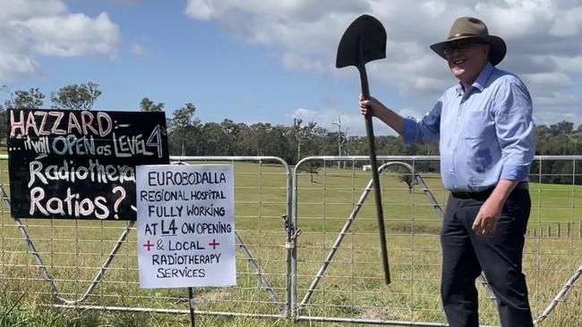 Dr Michael Holland unofficially turning the first soil for the new Eurobodalla Hospital. Picture: Tom McGan.