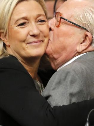 French far-right Front National leader Marine Le Pen and her father, Jean-Marie Le Pen who she has sought to distance herself from. Picture: AP Photo/Laurent Cipriani, File.