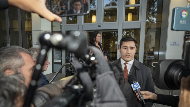 Dick Caine’s wife Jenny outside Bankstown Local Court behind lawyer Bryan Wrench. Picture: Liam Mendes / The Australian