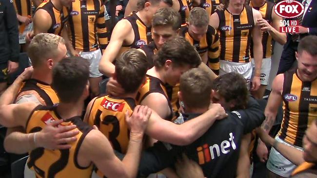 Sam Mitchell consoles his players following their devastating semi-final loss.