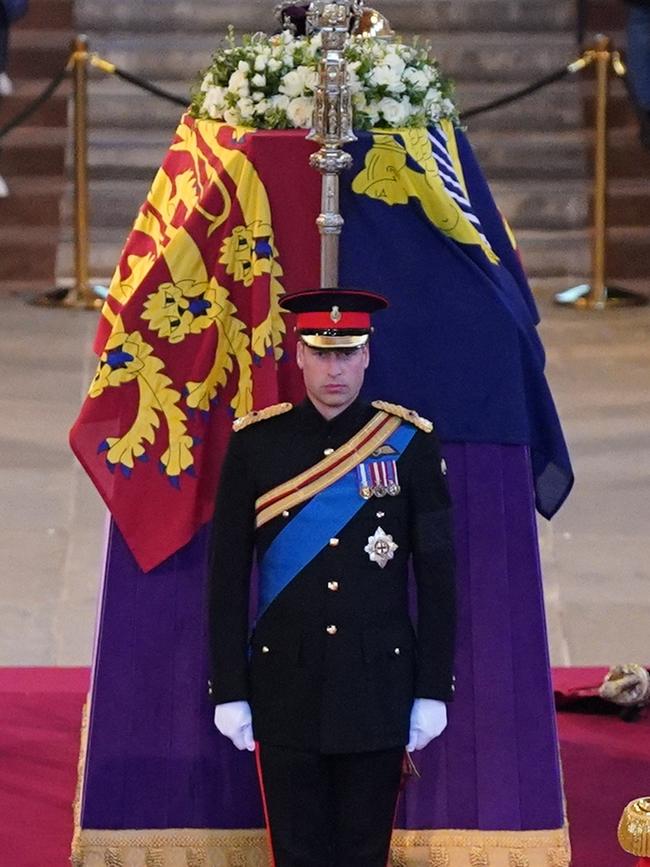 Prince William, Prince of Wales, holds a vigil in honour of Queen Elizabeth II at Westminster Hall.