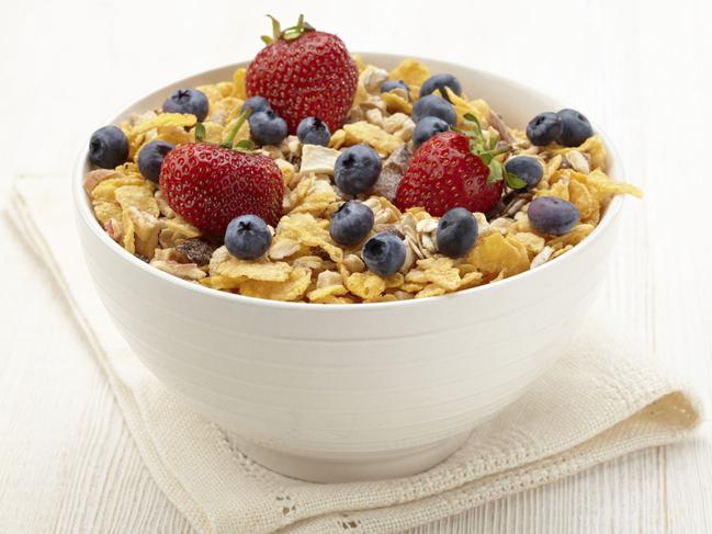 Generic food image of a bowl of muesli cereal with fruit.