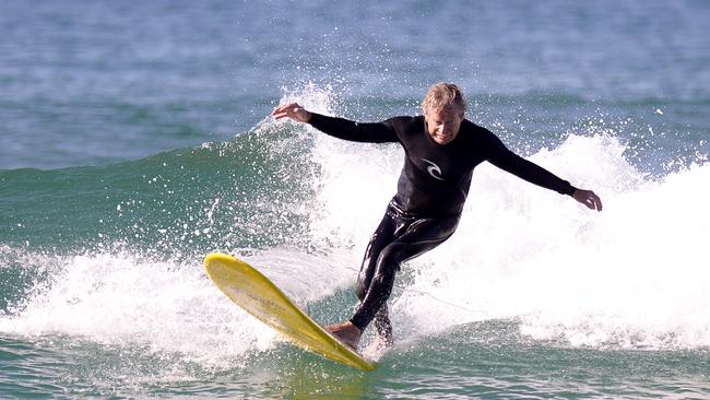 Midget Farrelly surfing at Dee Why Beach to celebrate 50 years since he won the first world surfing championship in 1964. Picture: David Swift