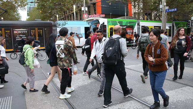 Pedestrians in Melbourne's CBD during rush hour in Bourke St. Picture: Ian Currie