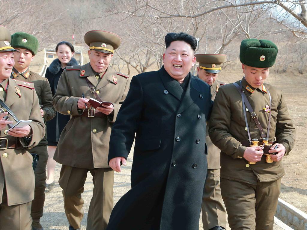 An undated picture shows North Korean leader Kim Jong-un and his sister Kim Yo-jong (3rd L). Picture: KCNA/AFP