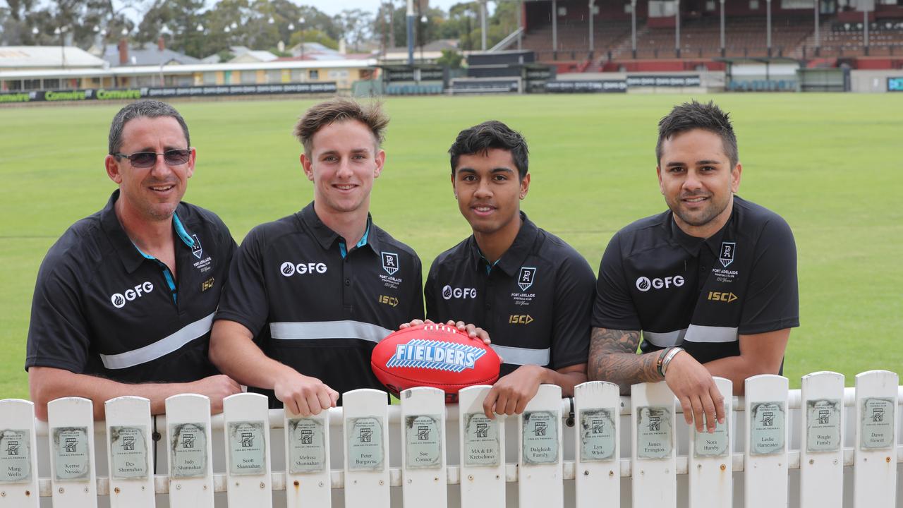 Father-son combinations Darren and Jackson Mead with Trent and Peter Burgoyne. Picture: AAP/Russell Millard