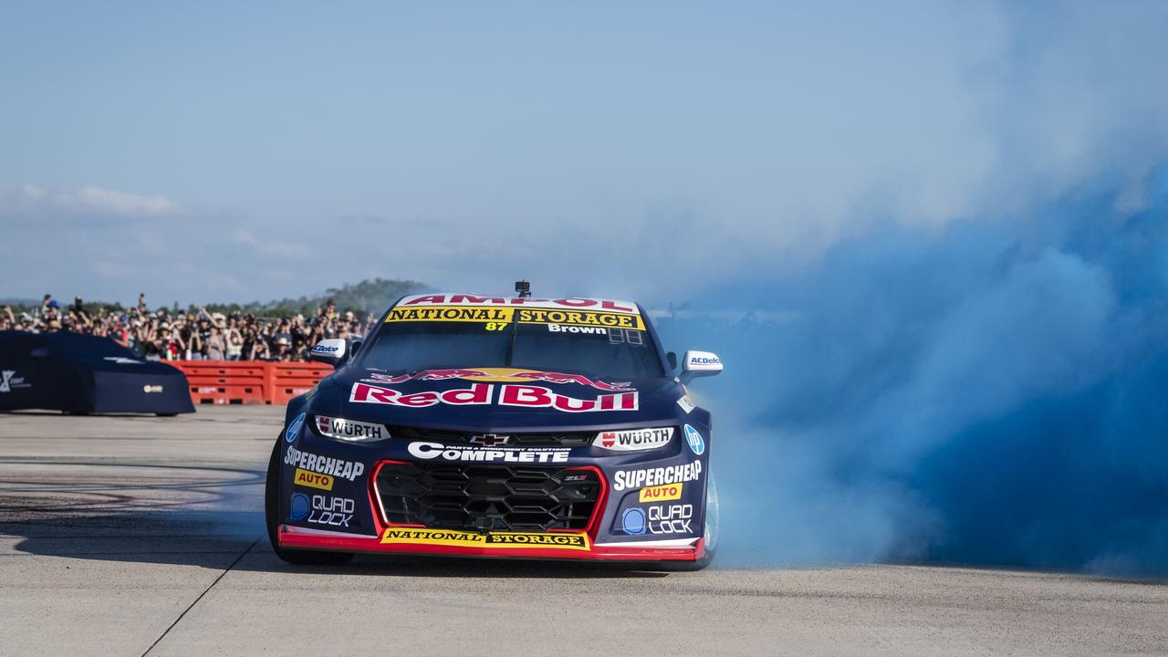 Toowoomba driver Will Brown burns rubber as V8 Supercars team Red Bull Ampol Racing launch their 2024 livery at Toowoomba Wellcamp Airport, Saturday, February 3, 2024. Picture: Kevin Farmer