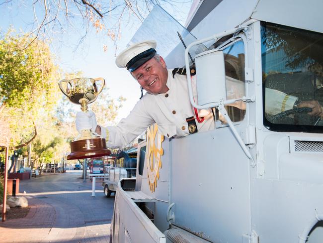 Captain Steven Smith with the Cup aboard the HMS Courage ahead of the Todd River Regatta, Alice Springs.