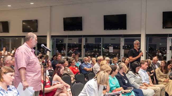 Joshua Hart (on microphone) asks Premier Steven Miles whether the government will commit to 10 per cent of mining royalties being spent on roads in the regions they were generated in, at Mackay Community Cabinet Town Hall. Picture: Michaela Harlow