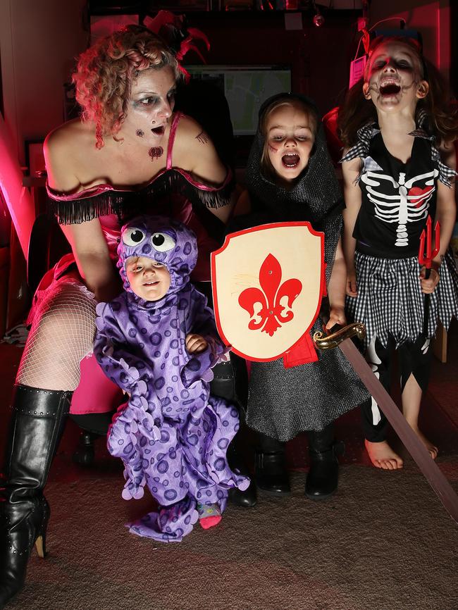 Cate Parsons and her three girls Faith, Storm and Hunter celebrating Halloween. Picture: George Salpigtidis