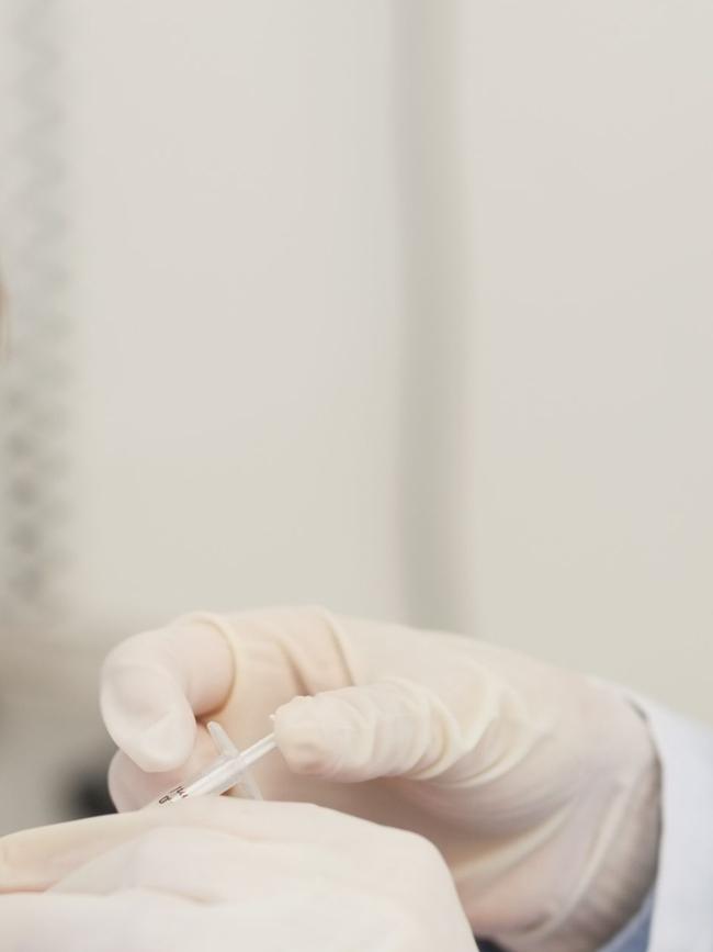 A child is given a vaccination shot. Generic Thinkstock image.