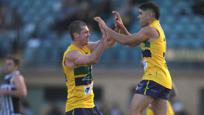 Eagles forwards Tyson Stengle (right) and Jake von Bertouch celebrate a goal against Port Adelaide at Woodville Oval. Picture: Dean Martin