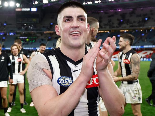 MELBOURNE, AUSTRALIA - JUNE 16: Brayden Maynard of the Magpies celebrates after his 200th match during the 2024 AFL Round 14 match between the North Melbourne Kangaroos and the Collingwood Magpies at Marvel Stadium on June 16, 2024 in Melbourne, Australia. (Photo by Michael Willson/AFL Photos via Getty Images)