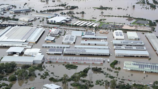 Eight-metre high floodwaters went through the Brisbane Markets site in Rocklea. Picture: Liam Kidston