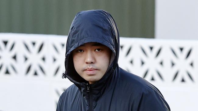 Pictured arriving at his home in Randwick is Nicholas Chu. Picture: Richard Dobson