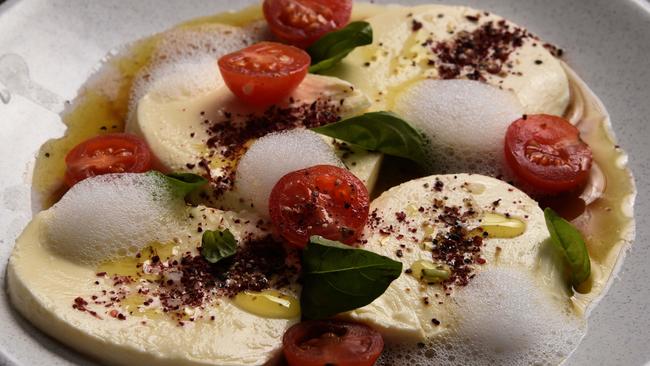 The Caprese Salad, mozzarella, cherry tomato, basil at Tasca restaurant in Coolangatta. Photo: Steve Holland