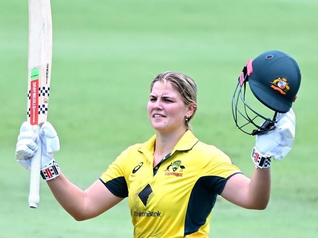 BRISBANE, AUSTRALIA - DECEMBER 08: Georgia Voll of Australia celebrates after scoring a century during game two of the Women's One Day International Series between Australia and India at Allan Border Field on December 08, 2024 in Brisbane, Australia. (Photo by Bradley Kanaris/Getty Images)