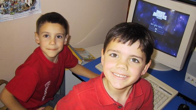 James Giezen and cousin Damon Challice playing computer games when they were younger. Picture: Supplied