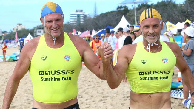 Trevor Hendy with fellow legend Grant Kenny in their final open Ironman race. Picture: Supplied